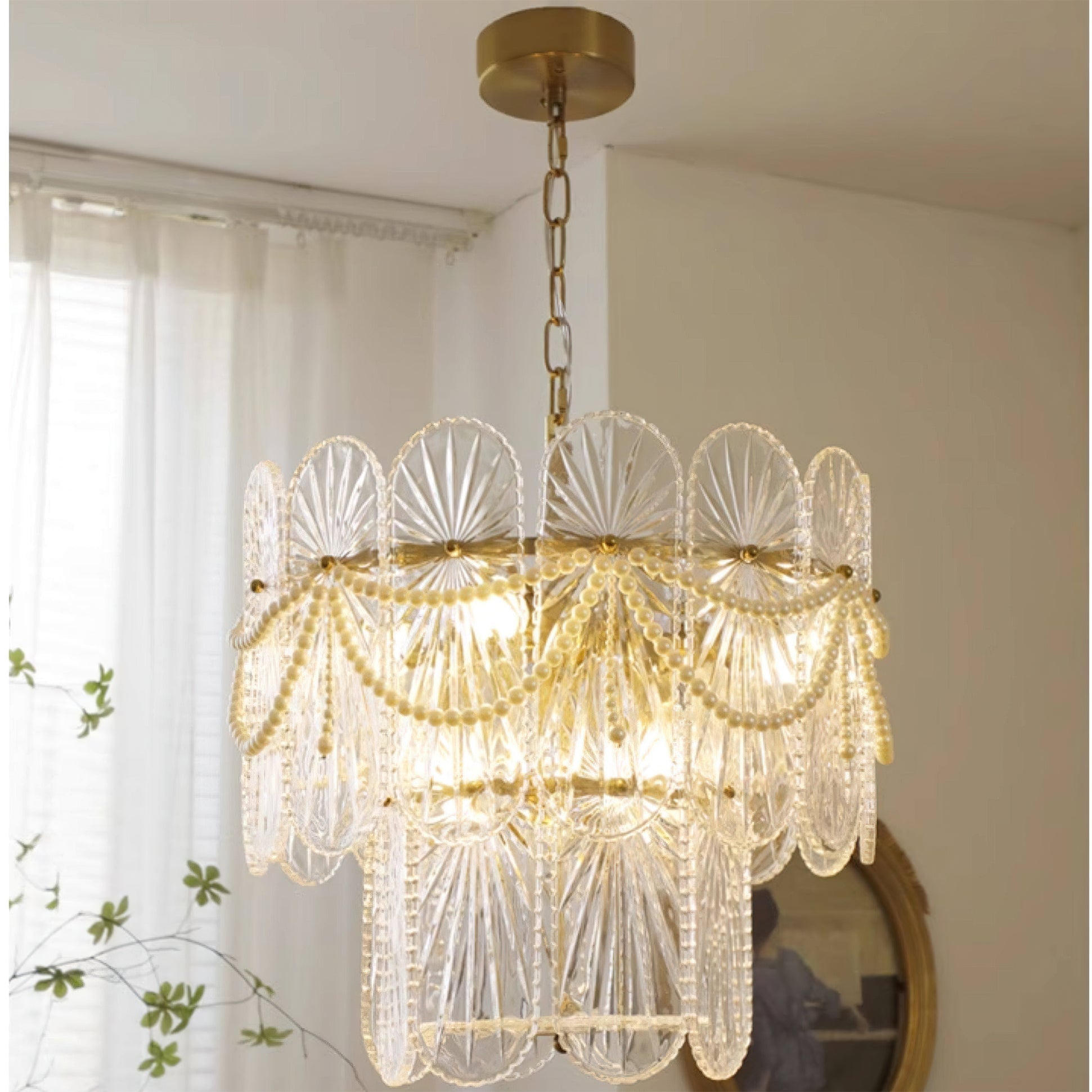 Close-up of the Art Deco inspired ribbed glass panels and pearl bead strands.