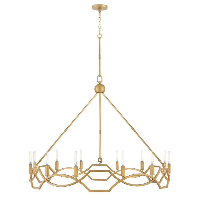 The chandelier illuminated, casting a warm glow in a room.