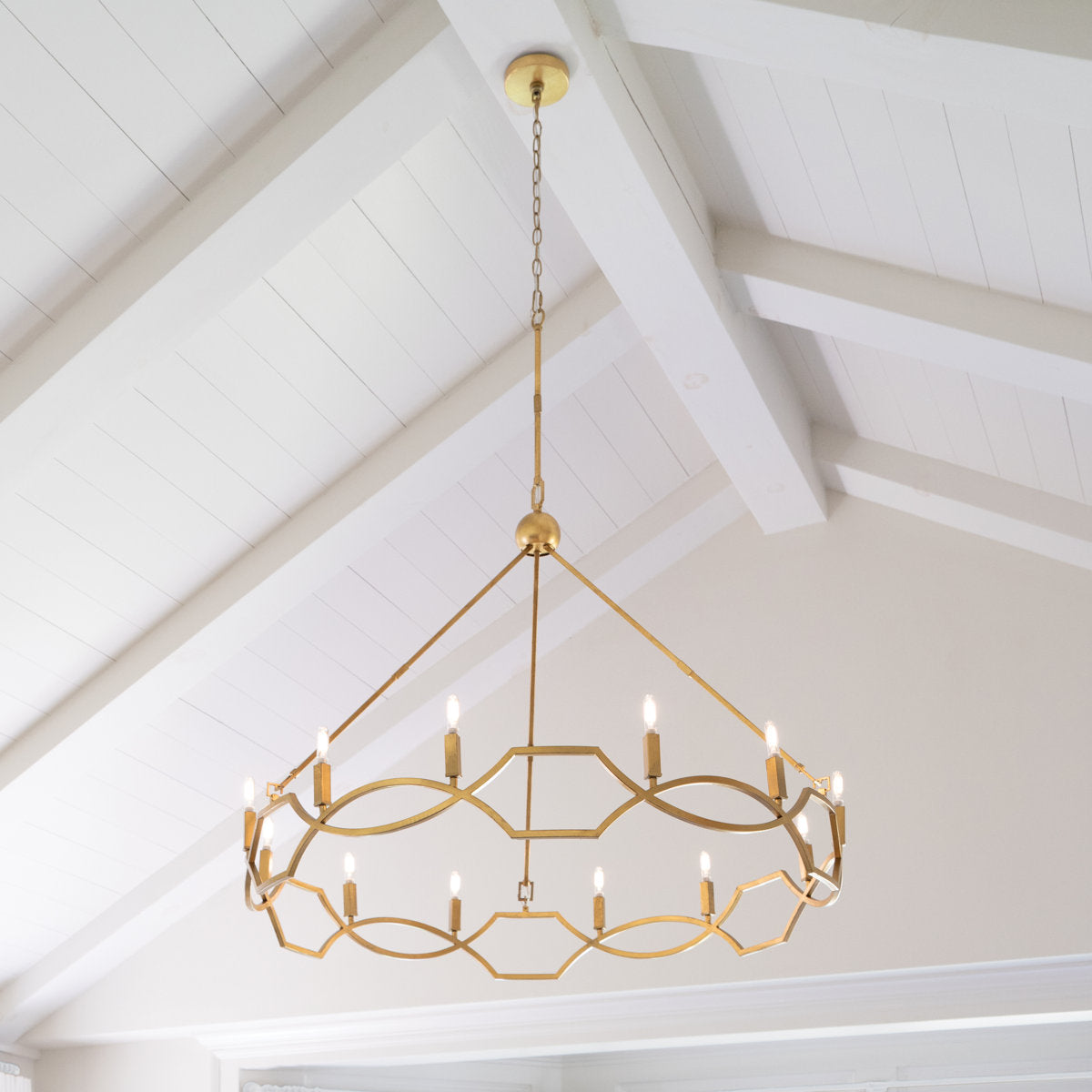 Close-up of the Leona Chandelier's brass arms and E12 sockets.