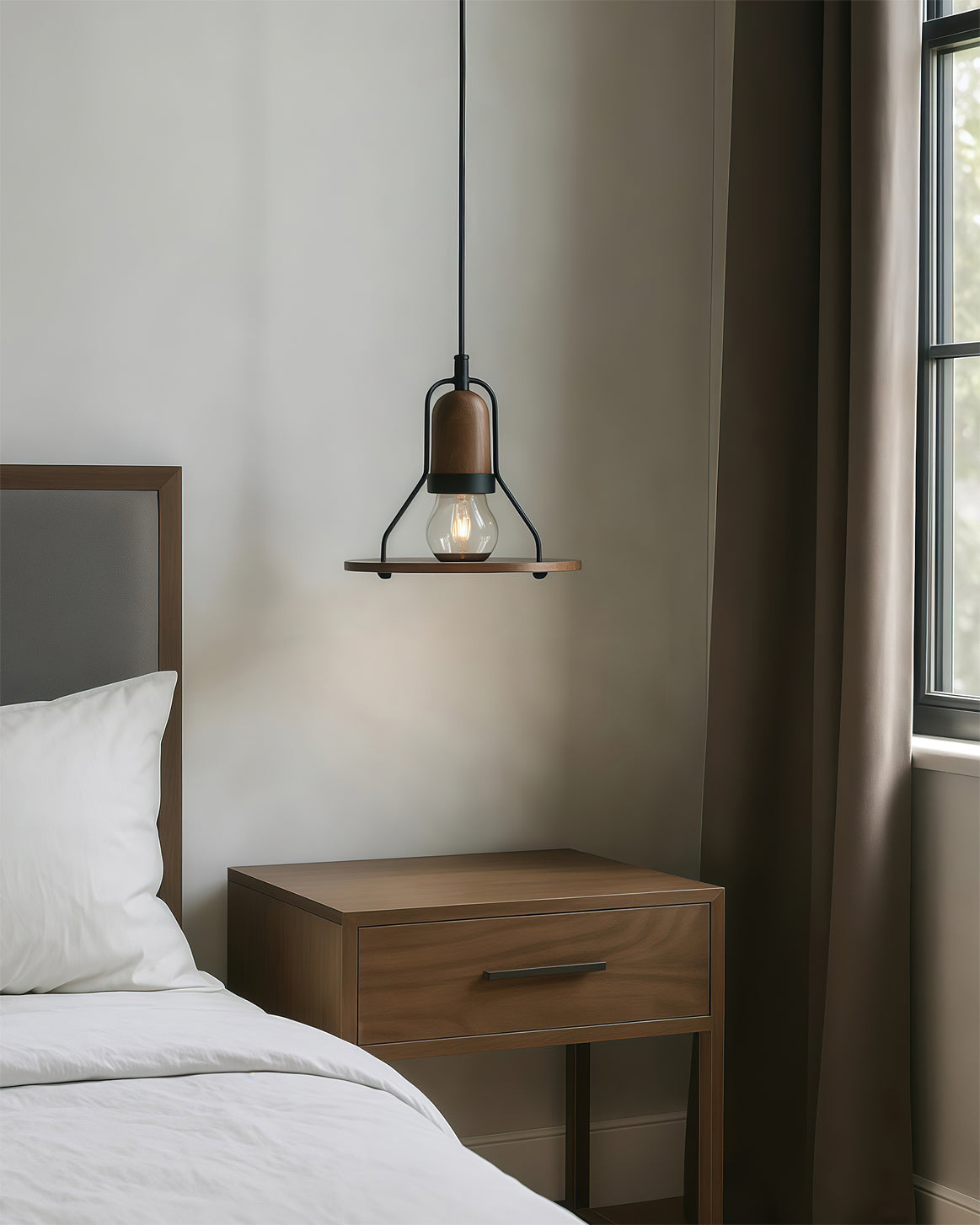 Lioren Pendant Lamp hanging in a minimalist dining area.