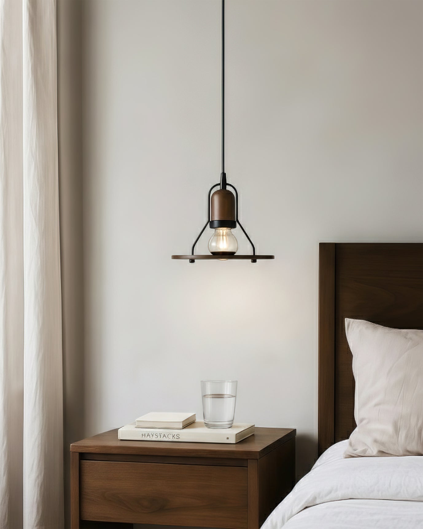 Side profile of the black metal Lioren Pendant Lamp.