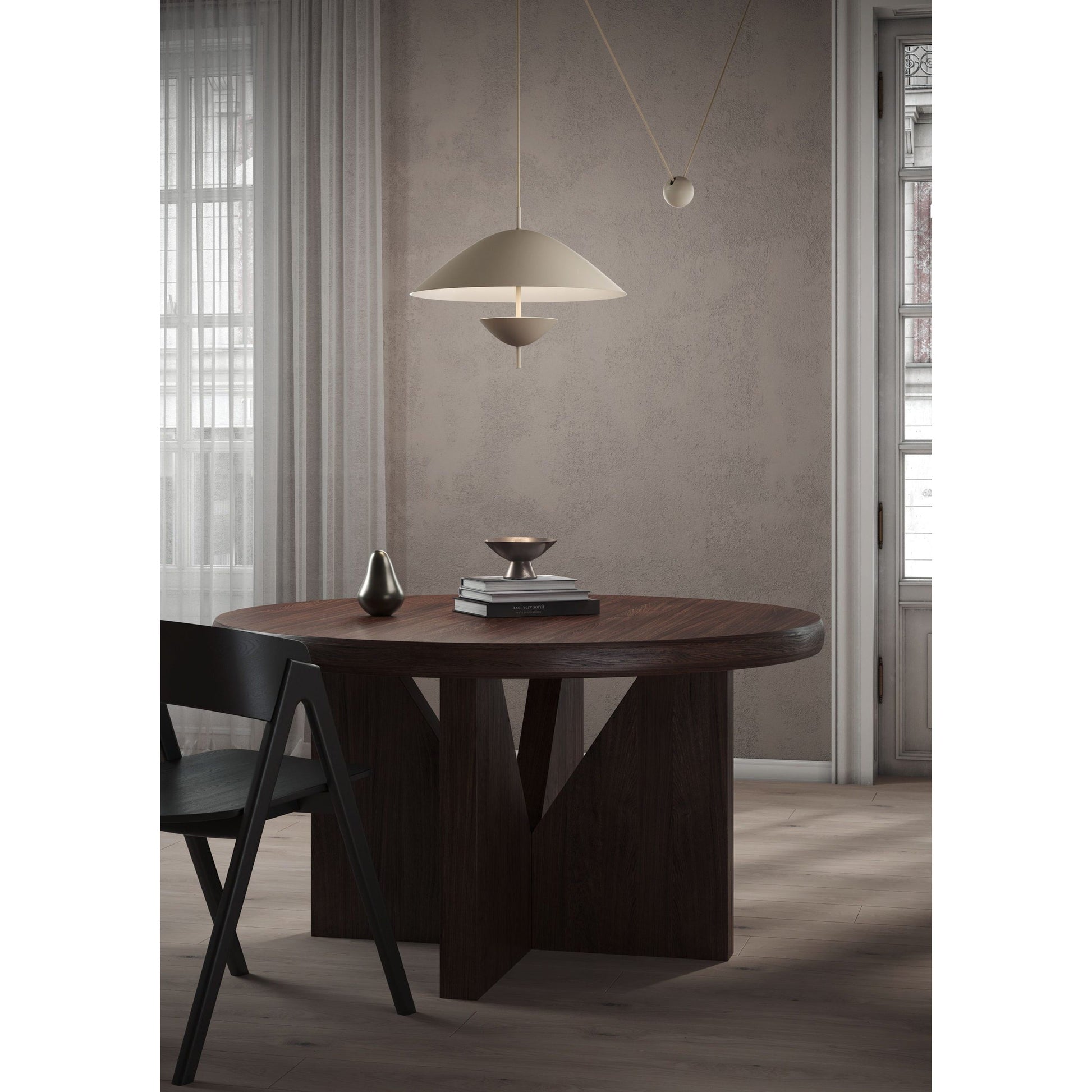 Black Lod Pendant Lamp shown in a modern living room setting.