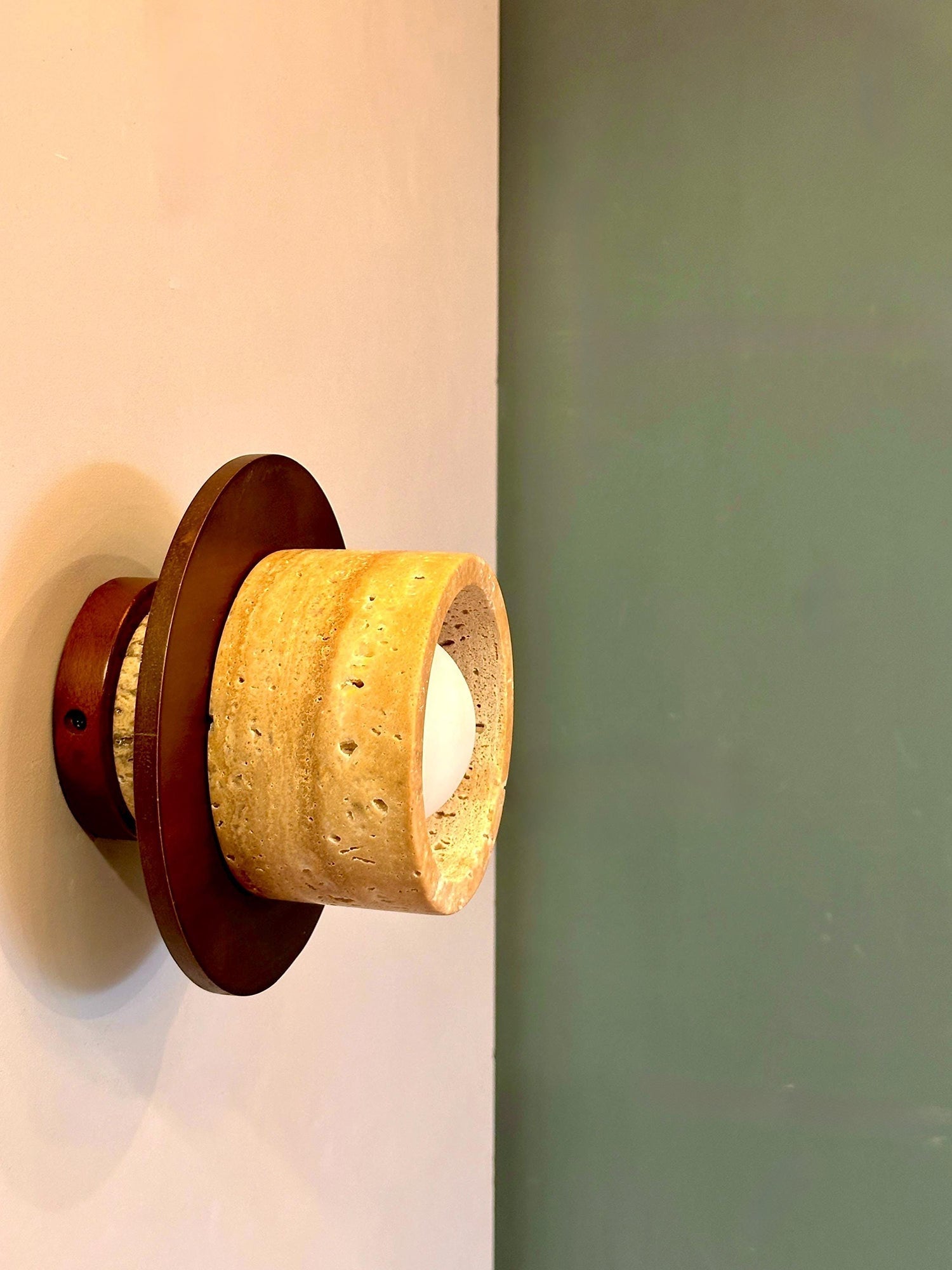 Angled view showing the glass lampshade and overall form.