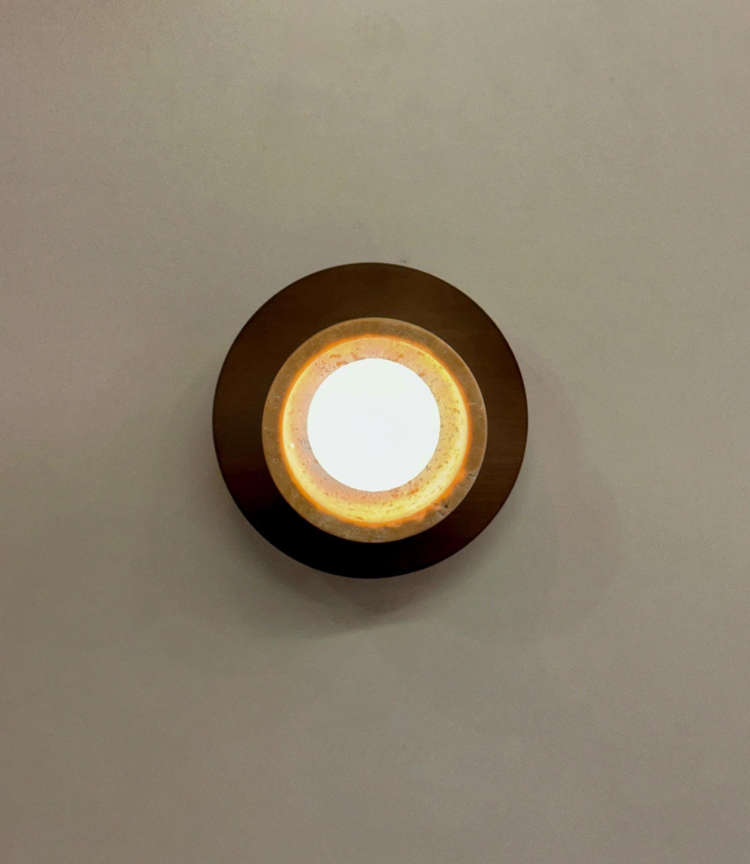 View of the lamp from below, showing the light source.