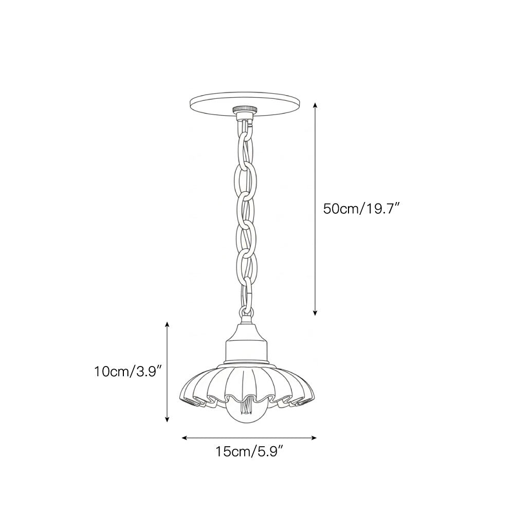 The Lola Pendant Lamp illuminated, casting a warm glow.