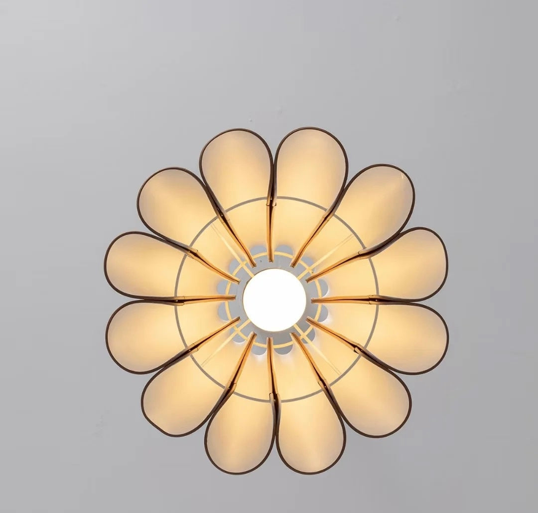 Lifestyle image of the Lora Pendant Lamp in a stylishly decorated room.