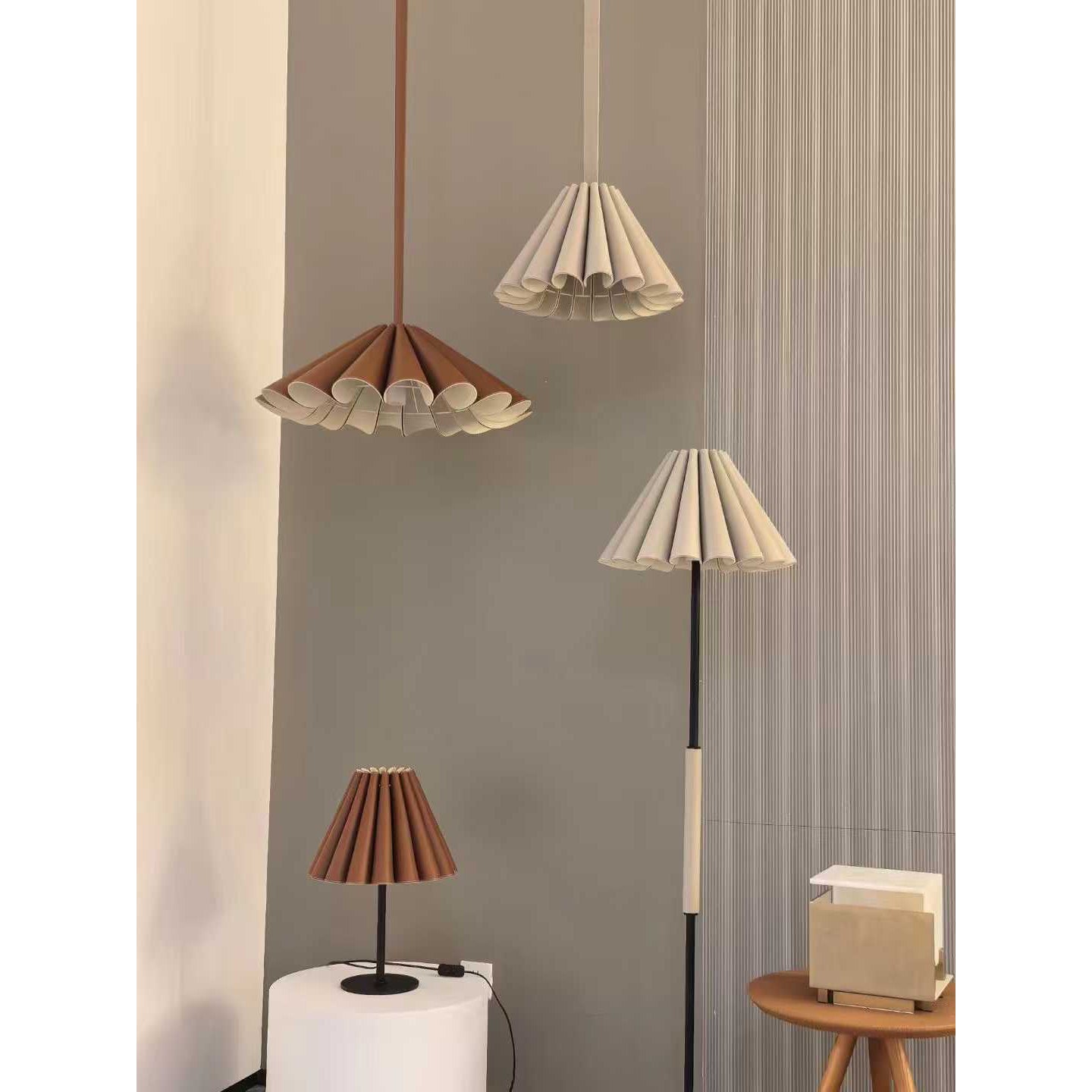Lora Pendant Lamp shown unlit to highlight its material and form.