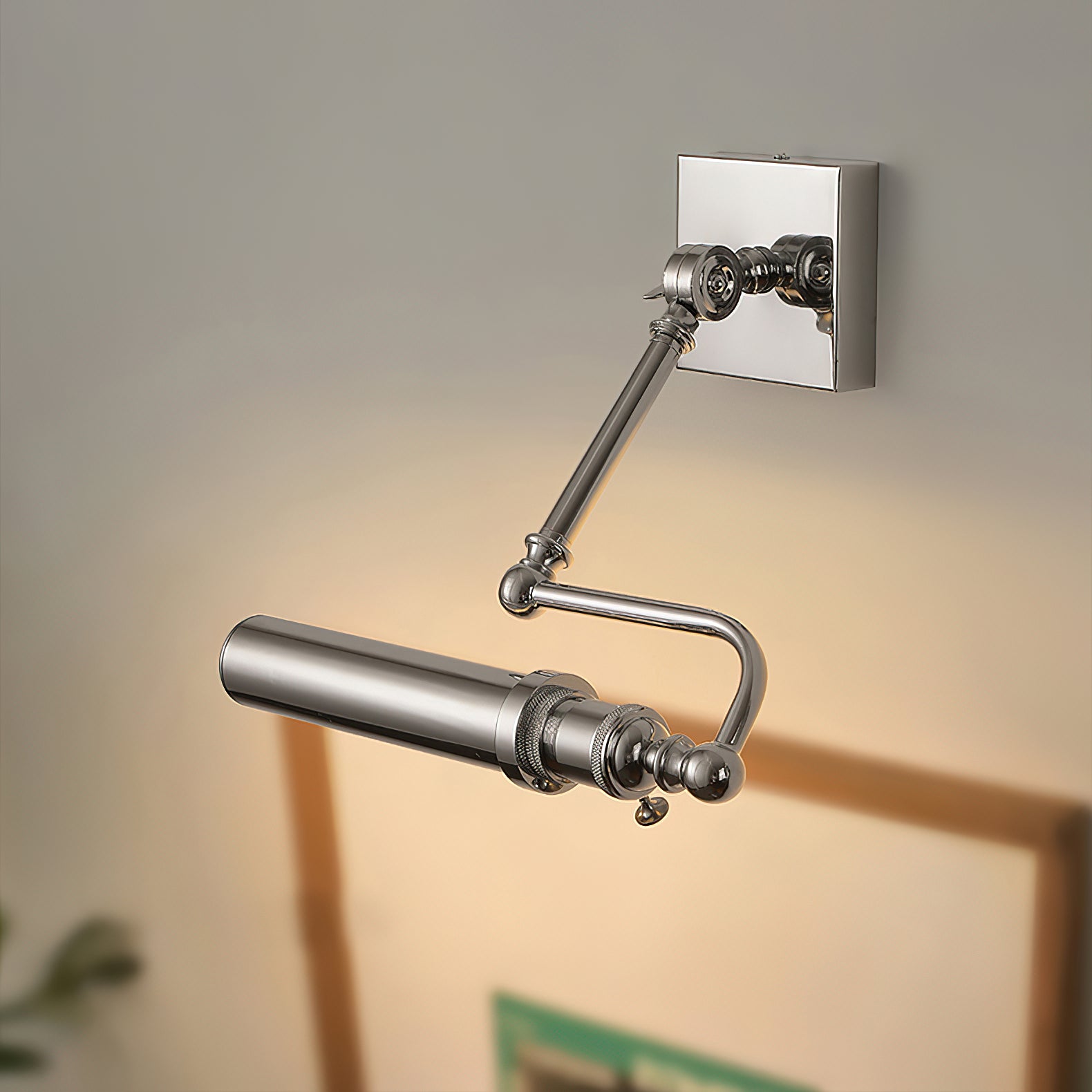 Close-up of the Luca Wall Lamp's multi-directional swivel joint.