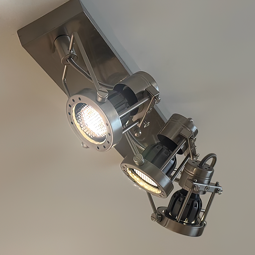 Angled view of the 2-head industrial ceiling lamp against a white background.