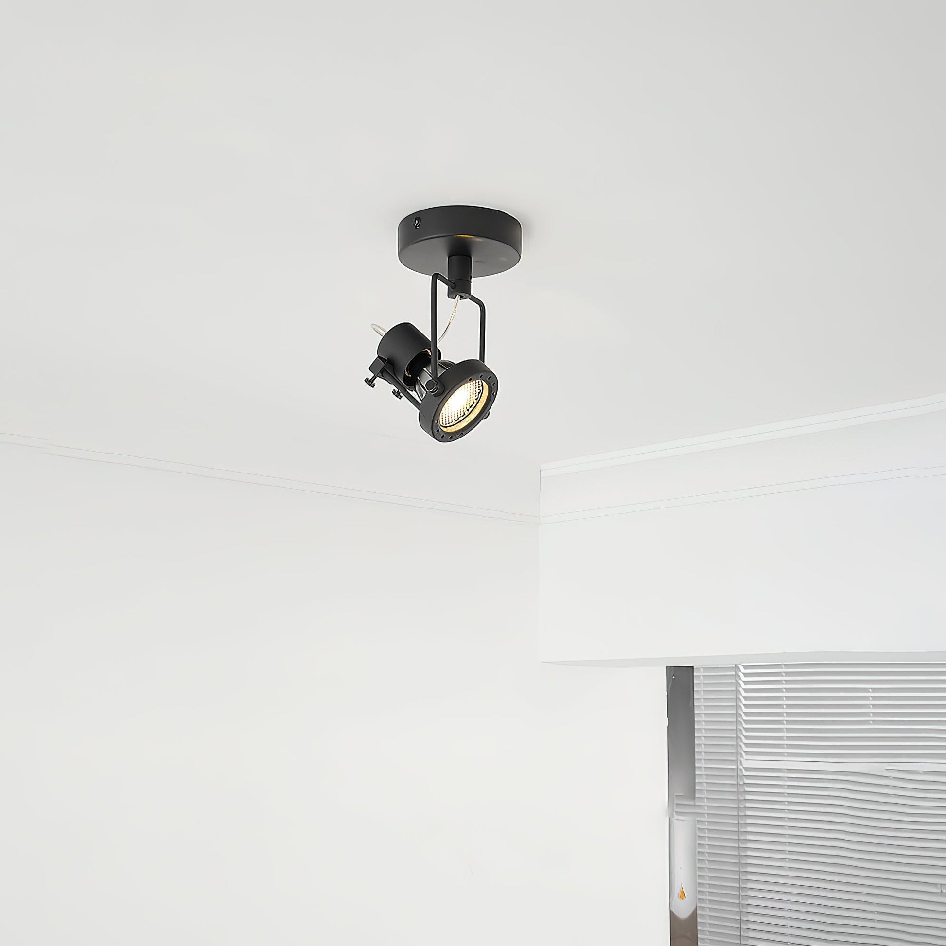 Detail shot of the GU10 socket on the industrial ceiling lamp.