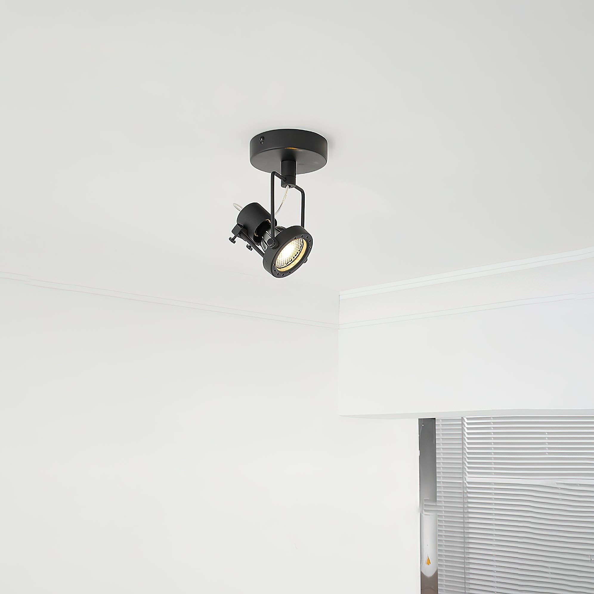 Detail shot of the GU10 socket on the industrial ceiling lamp.