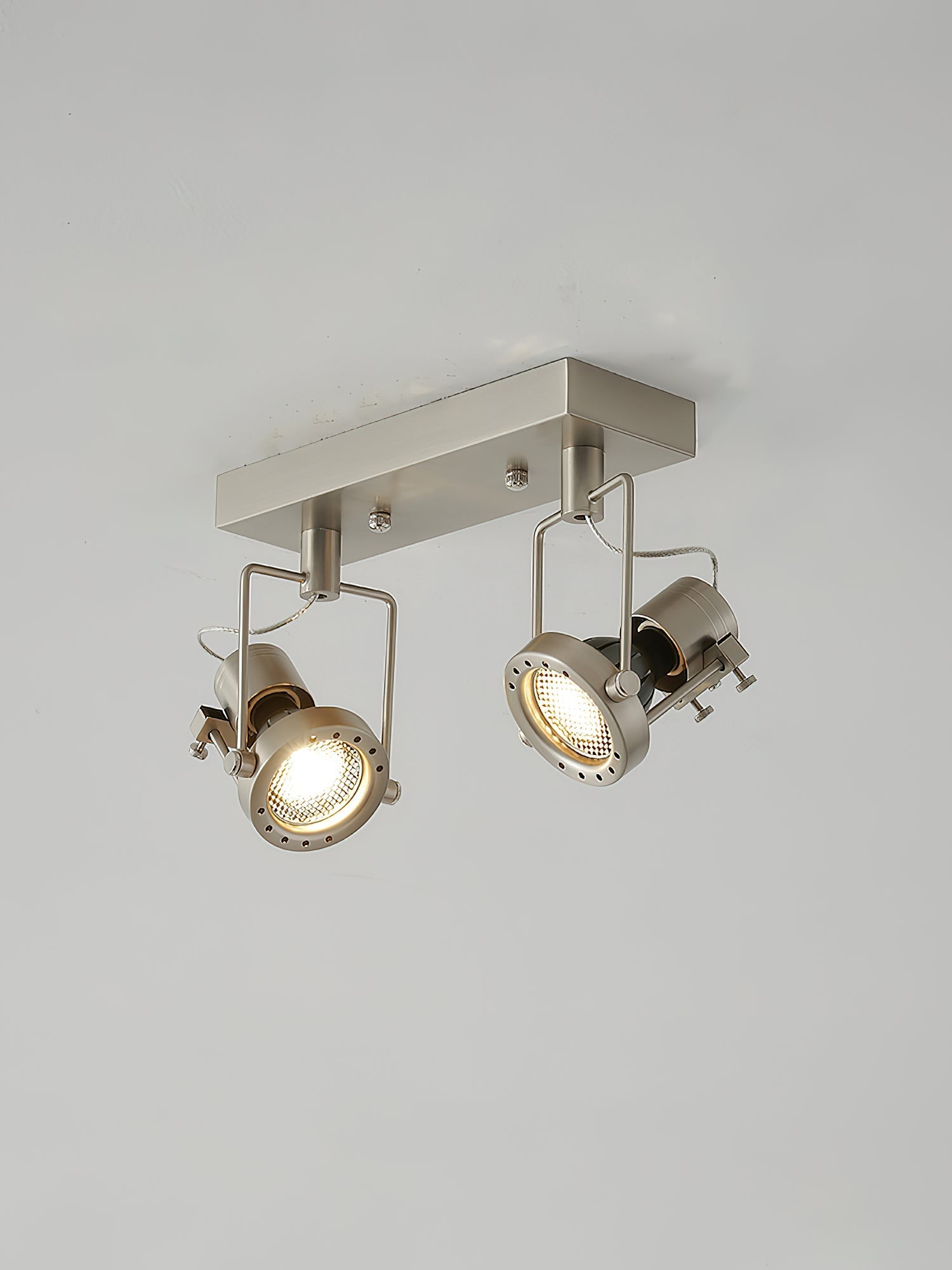 Close-up of the glass lampshade on the industrial ceiling lamp.