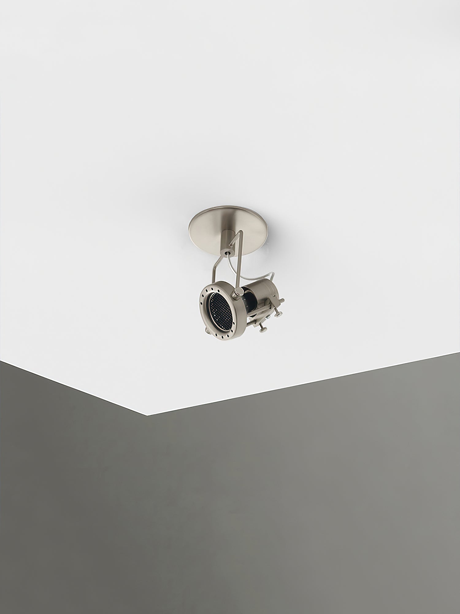 The ceiling lamp shown installed in a hallway.