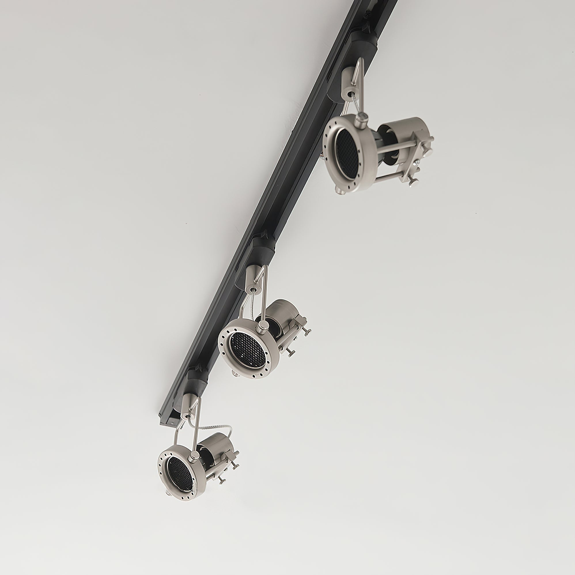 View showing the 360-degree rotation capability of the track light head.