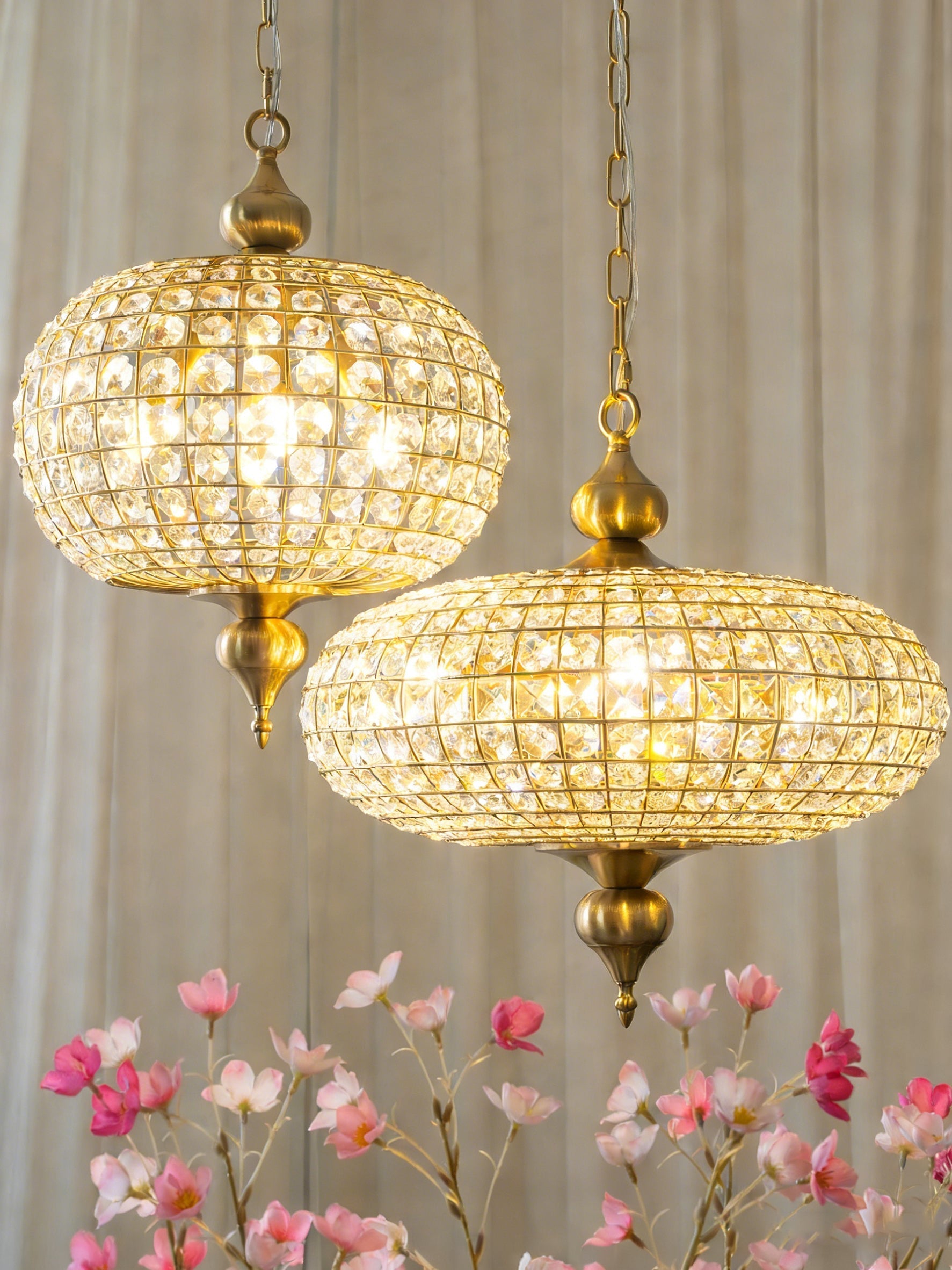 Lifestyle image showing the scale of the larger Lucille pendant light.