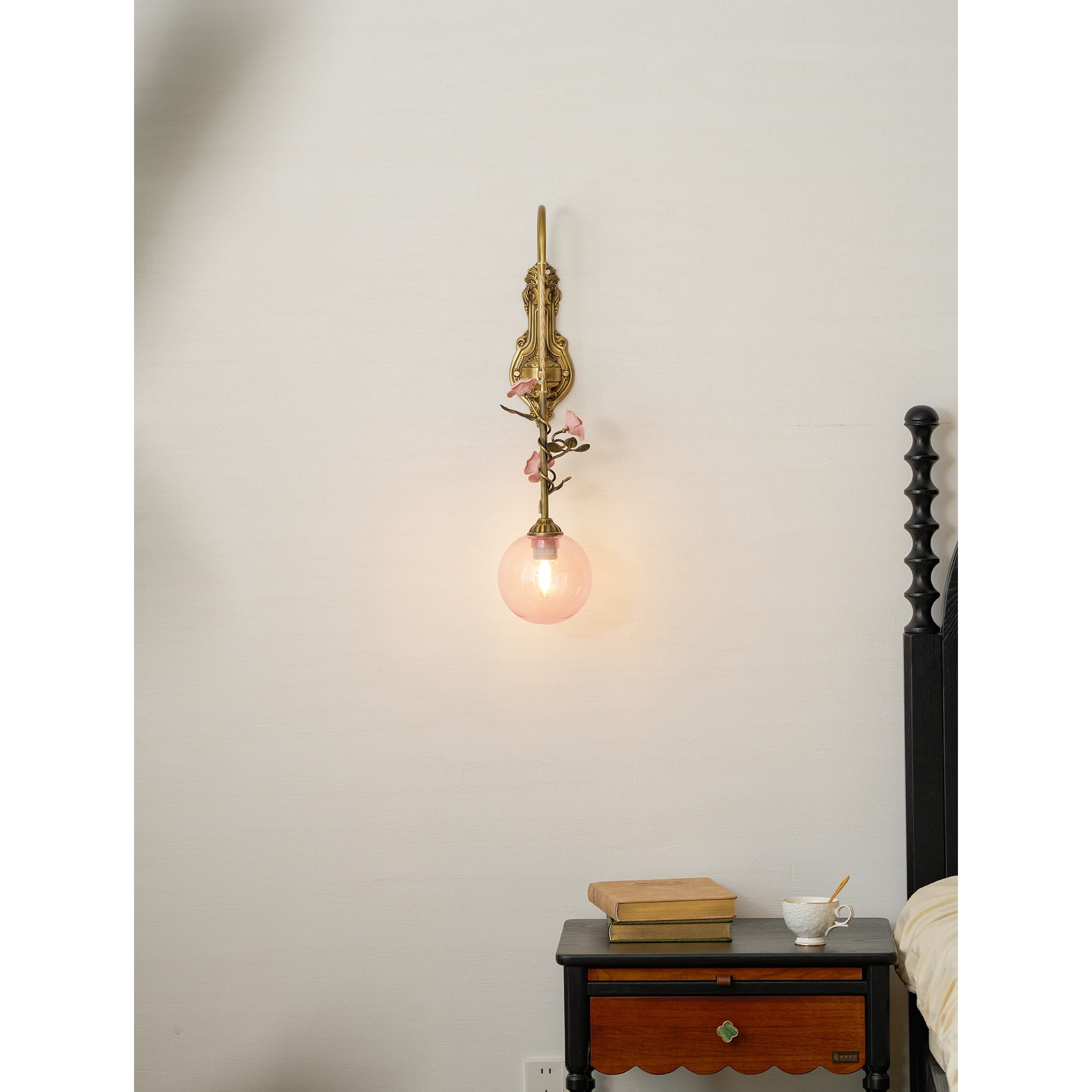 The Evelyn sconce providing ambient light in a hallway.