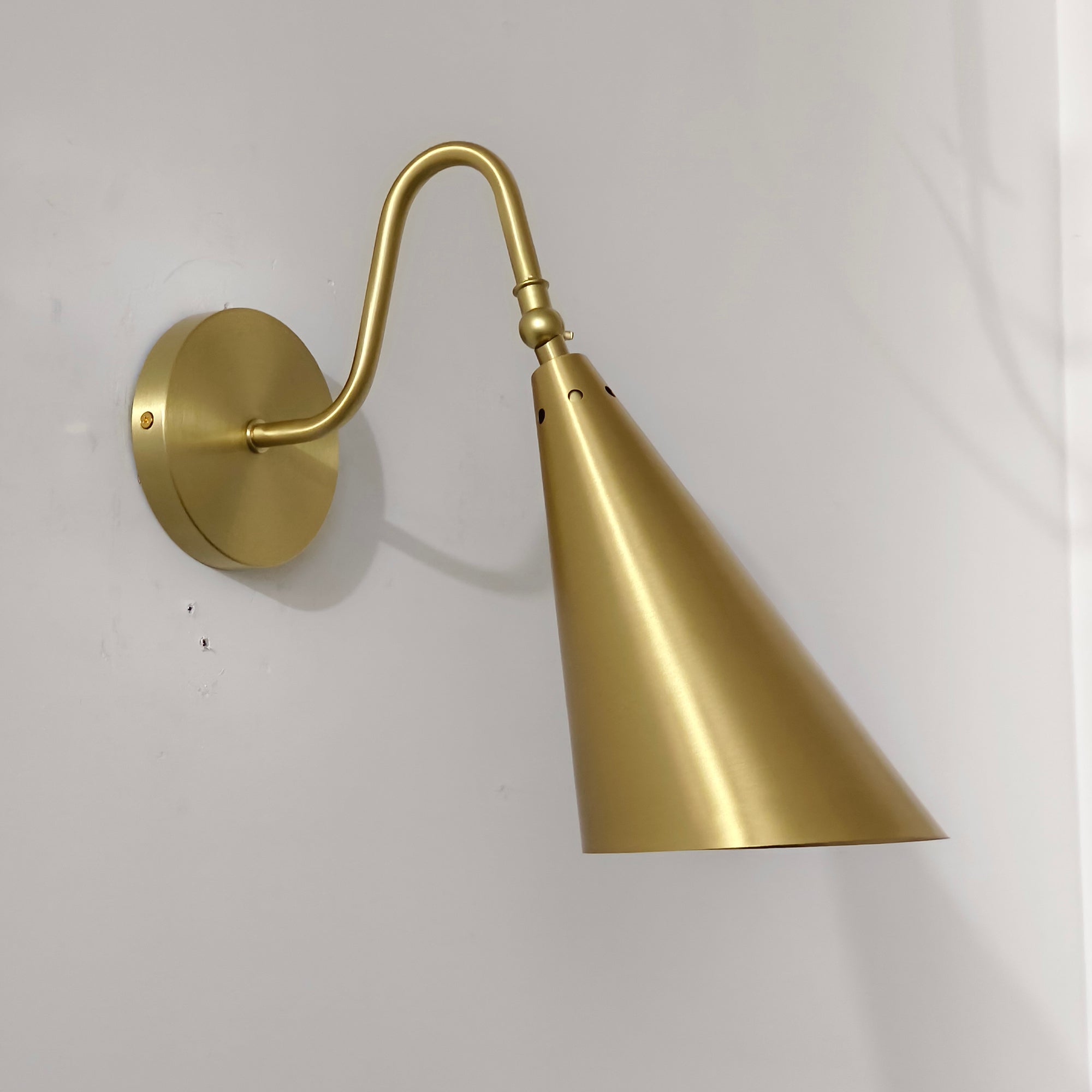 Lifestyle image showing the chrome lamp in a bathroom setting.