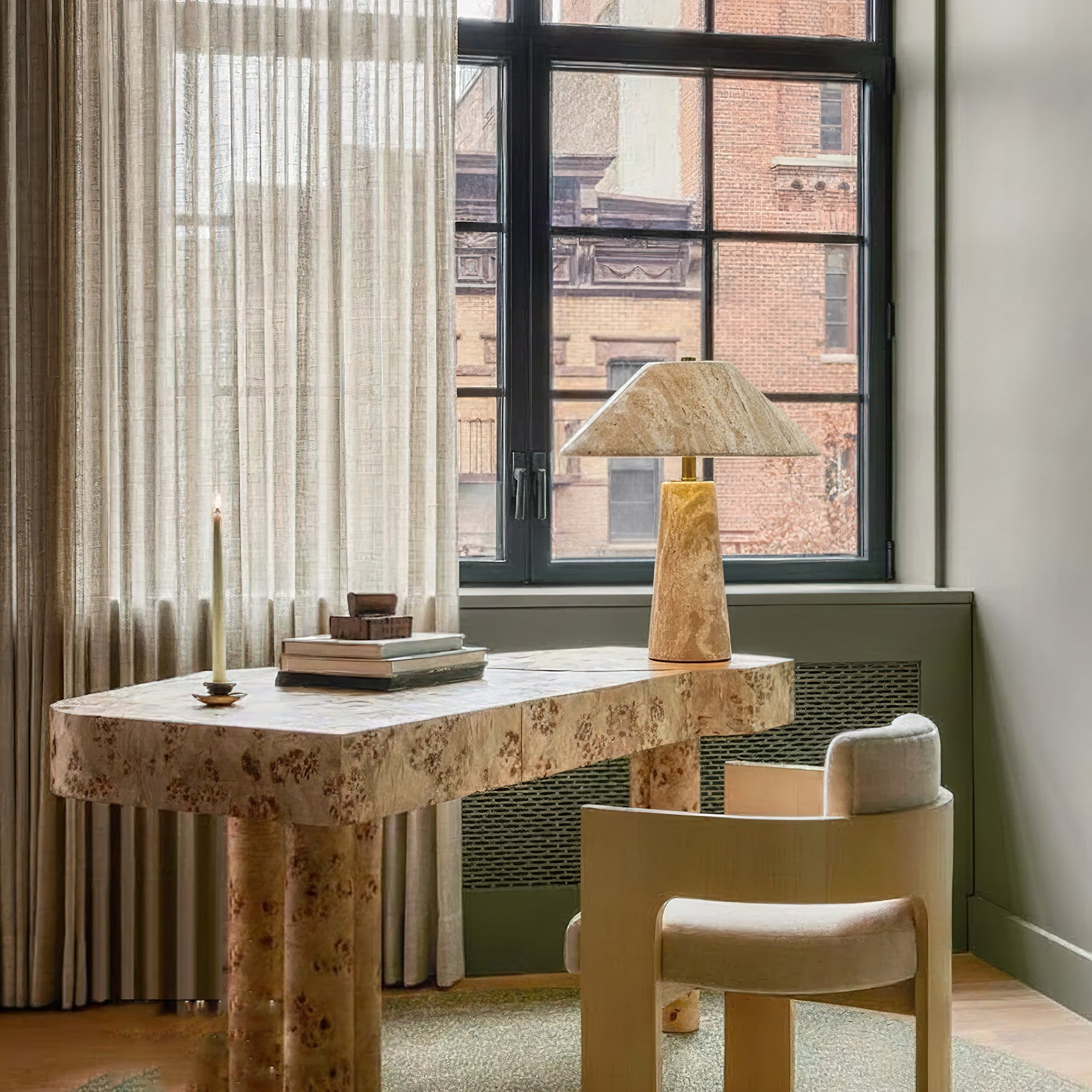 Close-up of the Lydia Table Lamp's natural travertine stone texture.