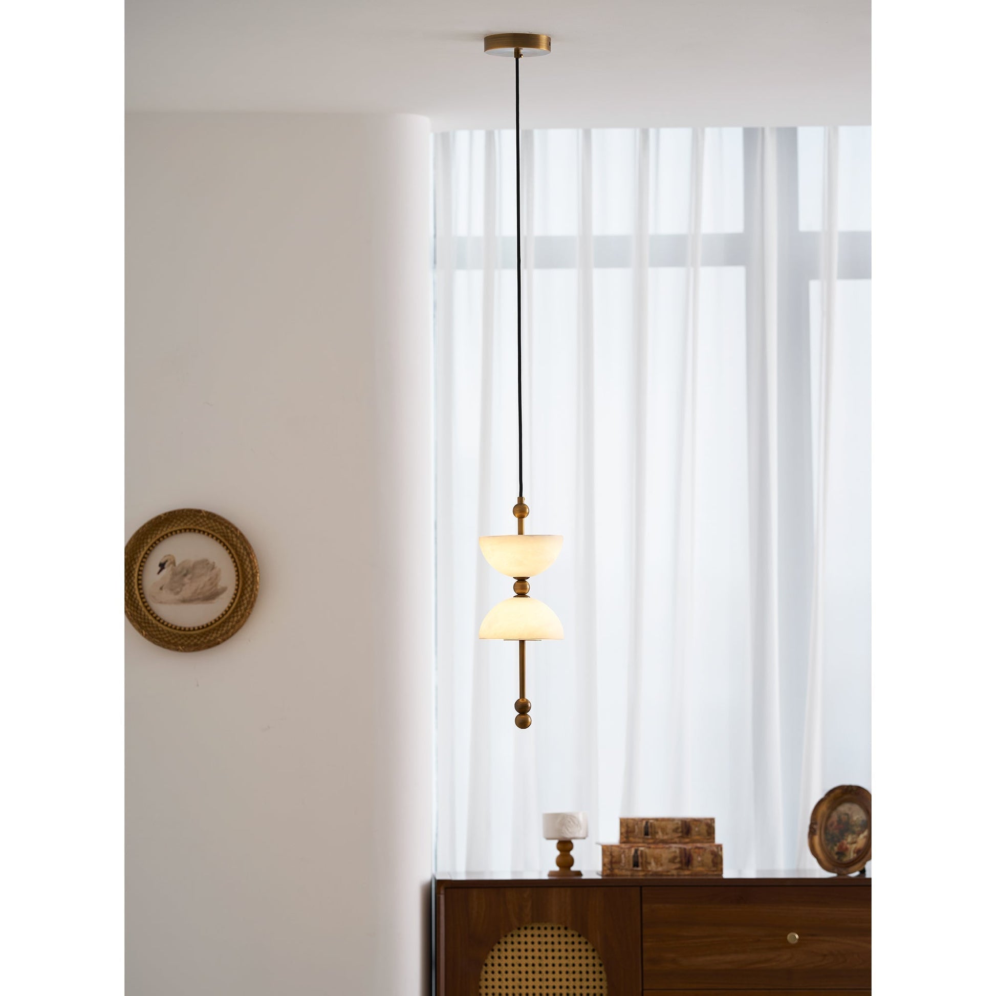 The black finish Lyra pendant lamp, unlit.