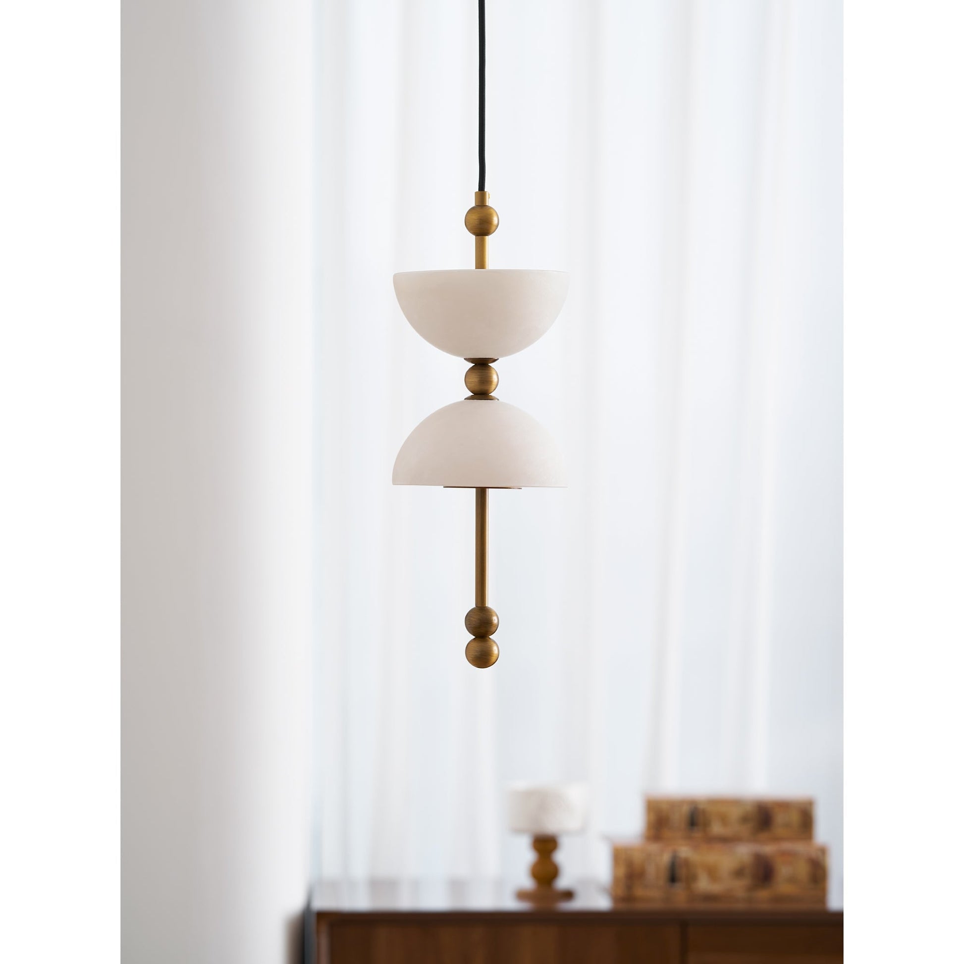 The larger D 20cm Lyra Alabaster Pendant Lamp.