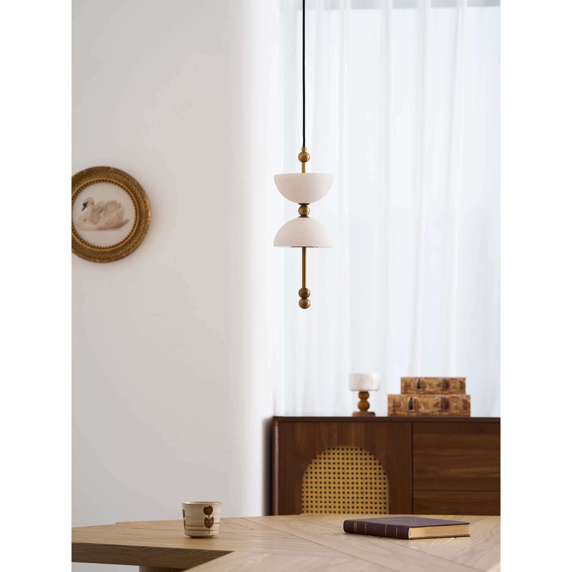 The white finish Lyra pendant lamp, unlit.