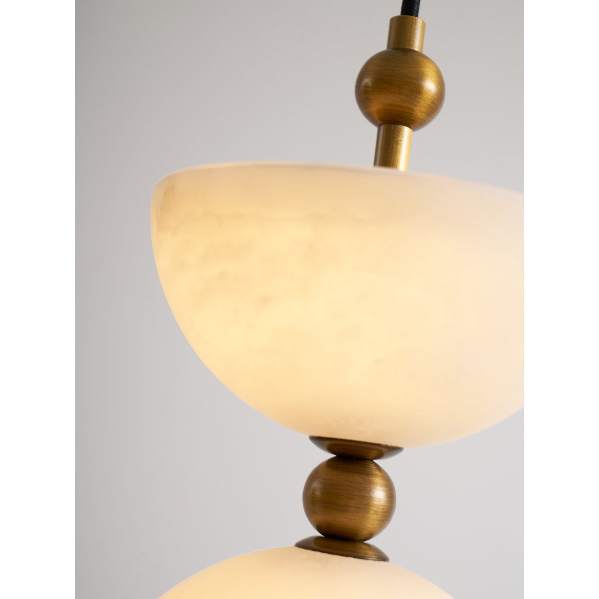 Lyra Chandelier with a black finish for a bold, contrasting look.