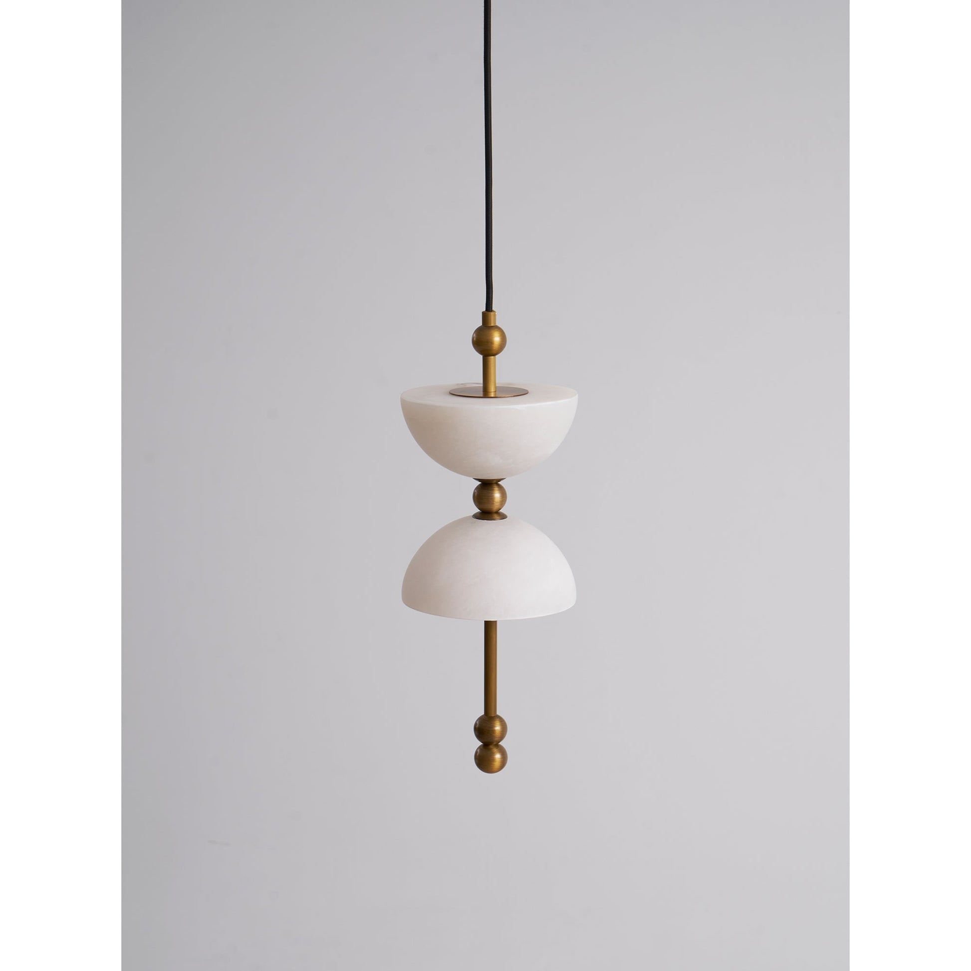 Close-up on the texture and color of the antique brass finish.
