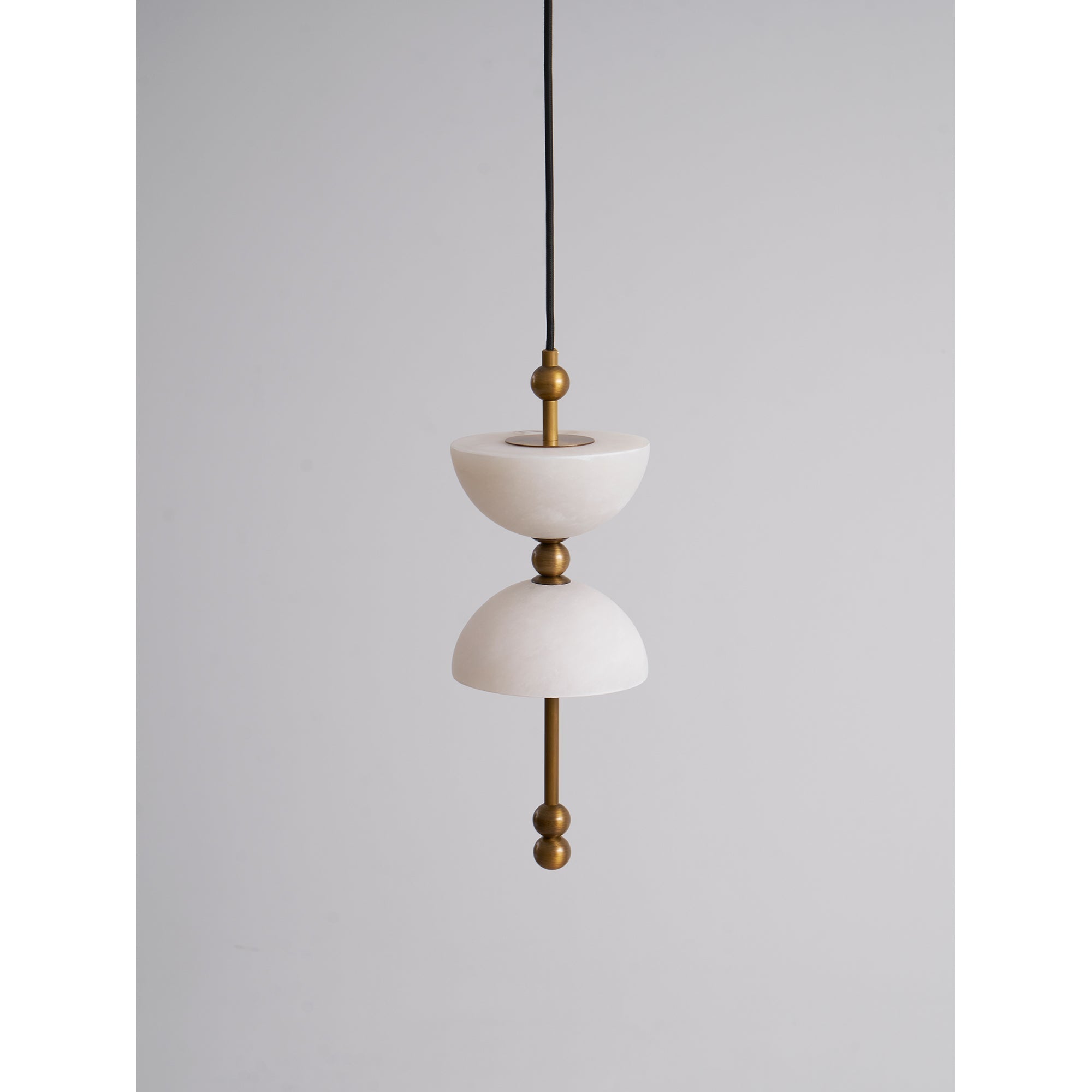 Close-up on the texture and color of the antique brass finish.