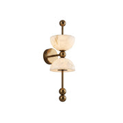Lyra Alabaster Wall Lamp with brass finish.