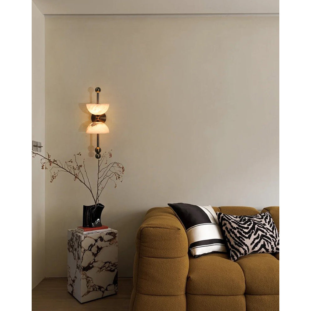 Lyra Alabaster Wall Lamp in a dark bronze finish.
