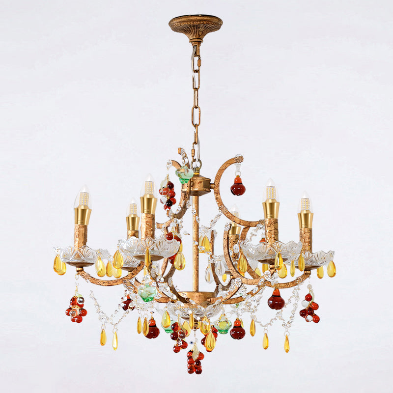 The hanging chain and ceiling canopy with a matching gold leaf finish.