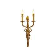 Front view of the Madeleine Brass Wall Lamp with a ribbon motif.