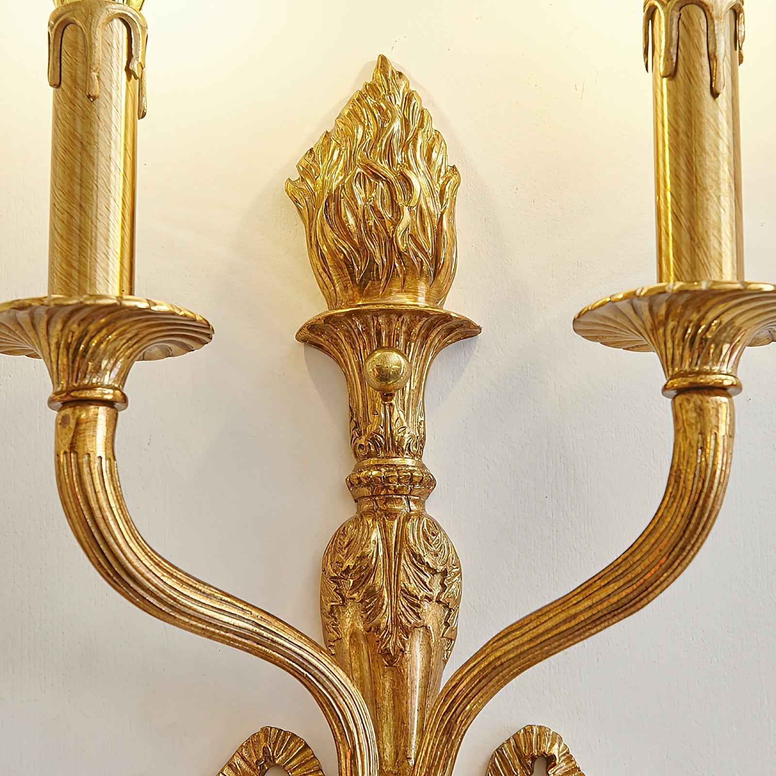 Detail shot emphasizing the texture of the brass material.