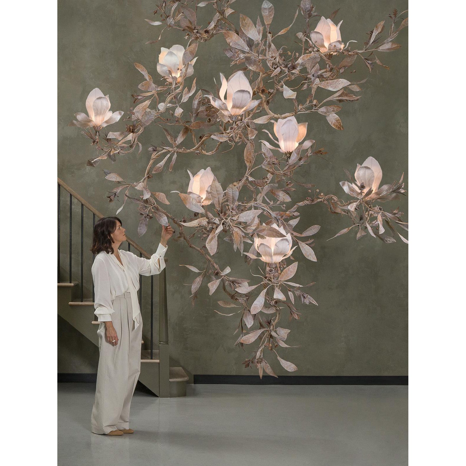 Angled view of the Magnolia Grandiflora Chandelier in a modern, minimalist setting.