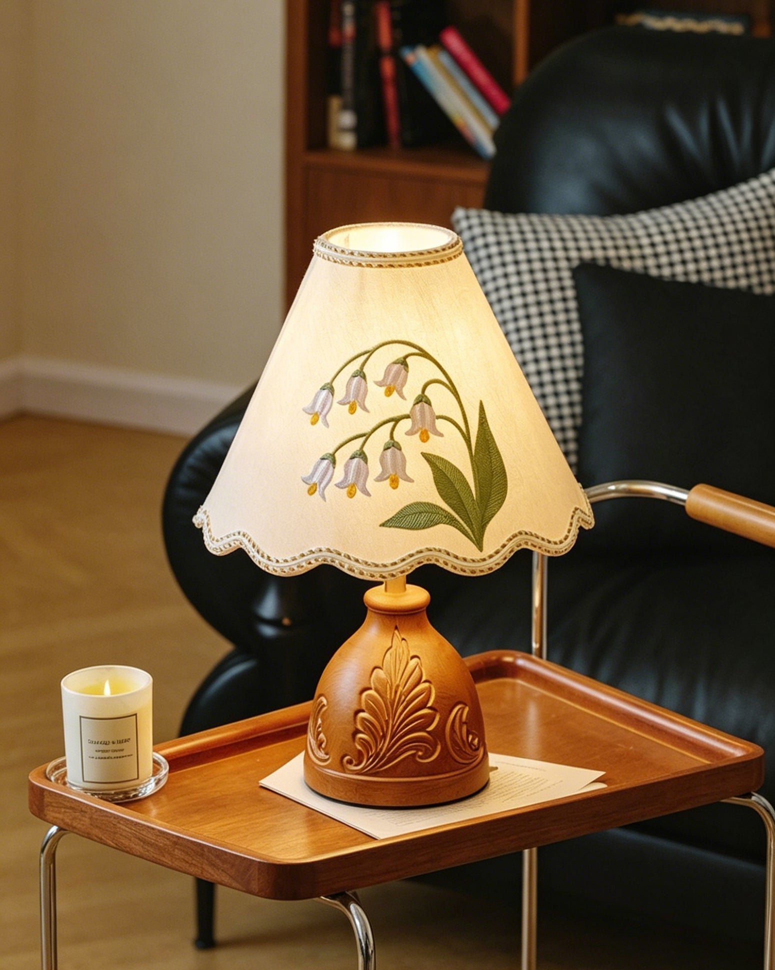 Maisie Table Lamp against a neutral wall to highlight its design.