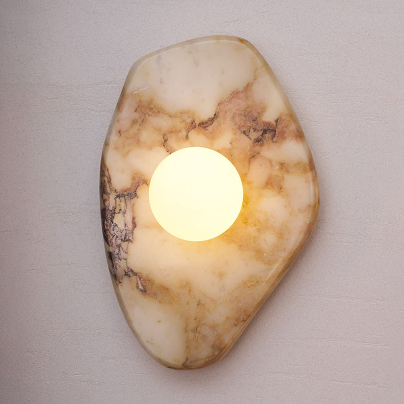 Purple marble wall lamp with a unique, artistic shape.