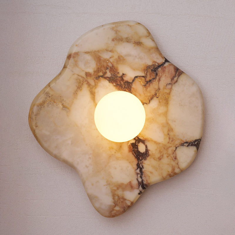 The unique pattern of Pandora quartz on a wall lamp.