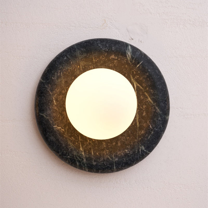 Cyan jade wall lamp, showcasing its unique color.