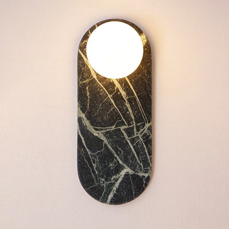 Purple marble wall lamp in a luxury setting.