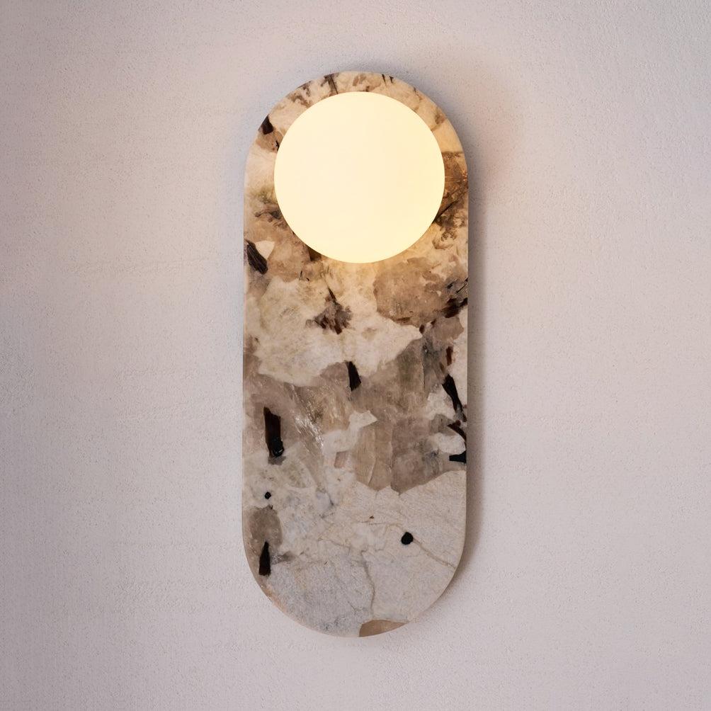 Black marble and white alabaster lamp, detail view.