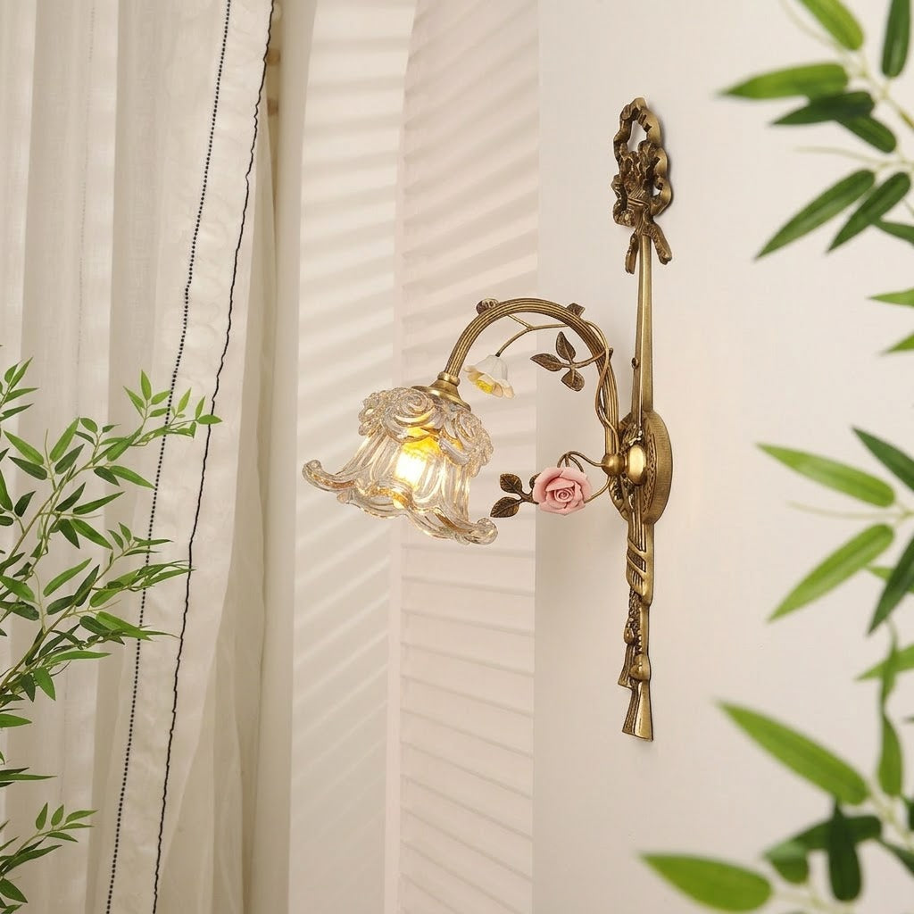 Side view of the Margaux Fleur Wall Lamp in Antique Bronze.