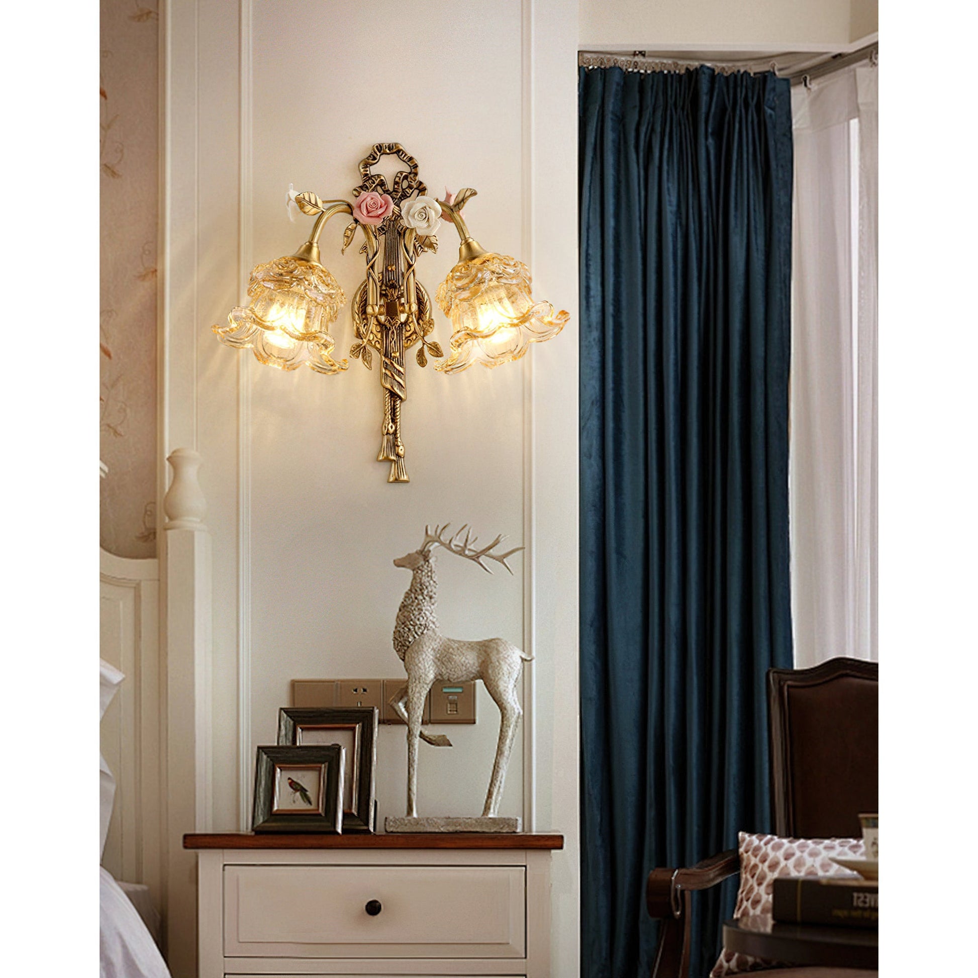 The lamp shown lit, demonstrating the warm diffusion of light through the glass shade.