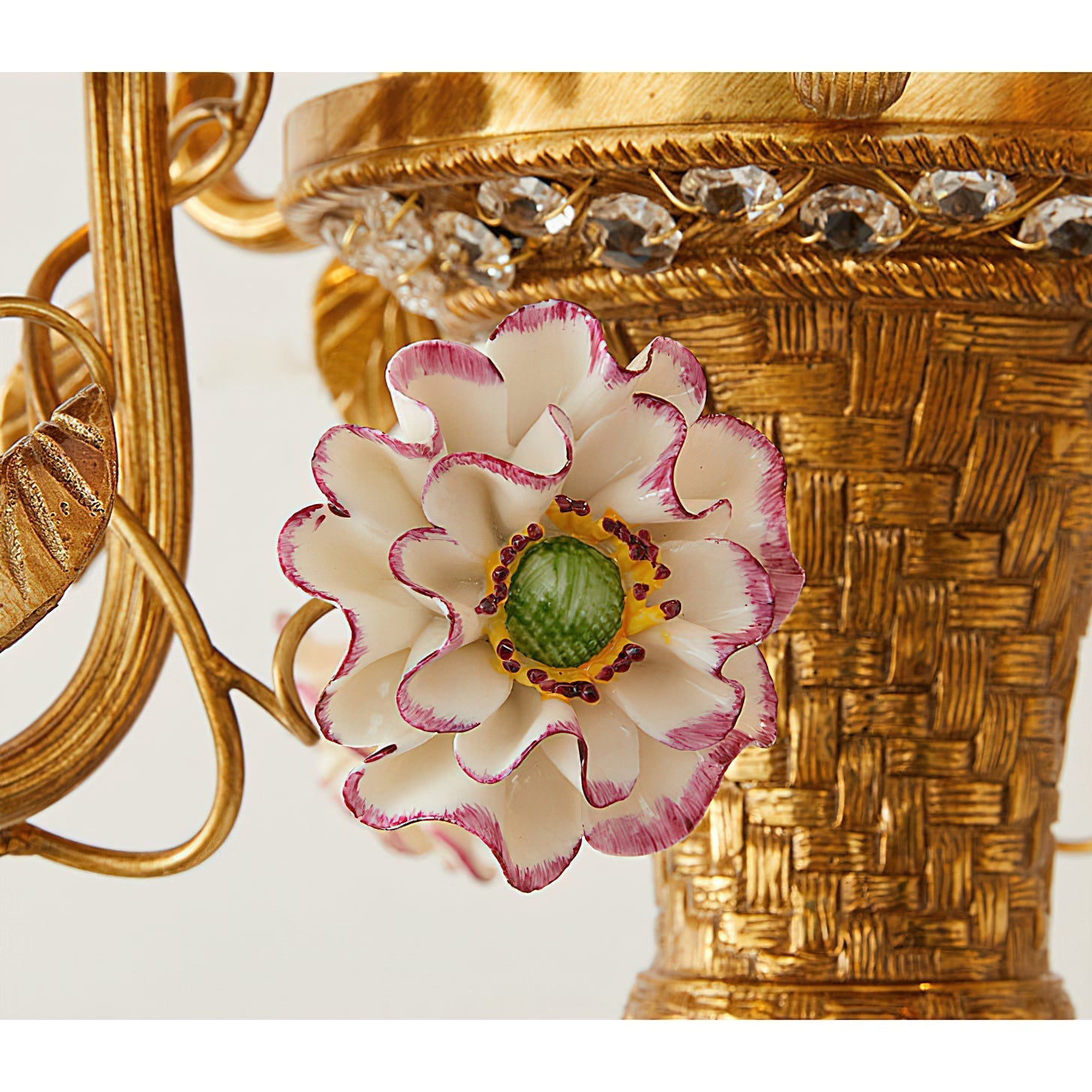 Lifestyle image featuring the chandelier over a dining table.