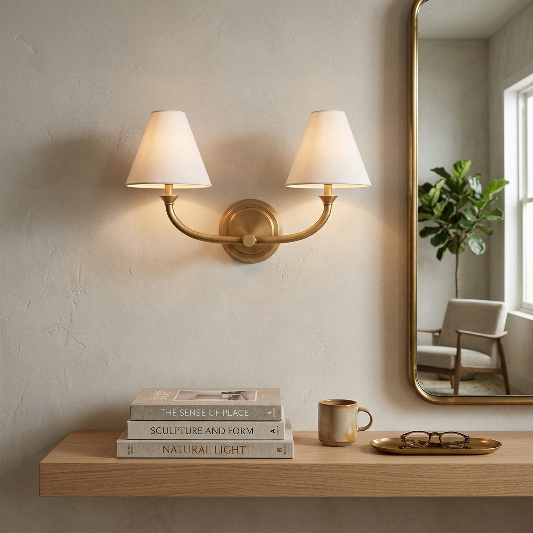 Two-headed Greta Wall Lamp in black finish, angled view.