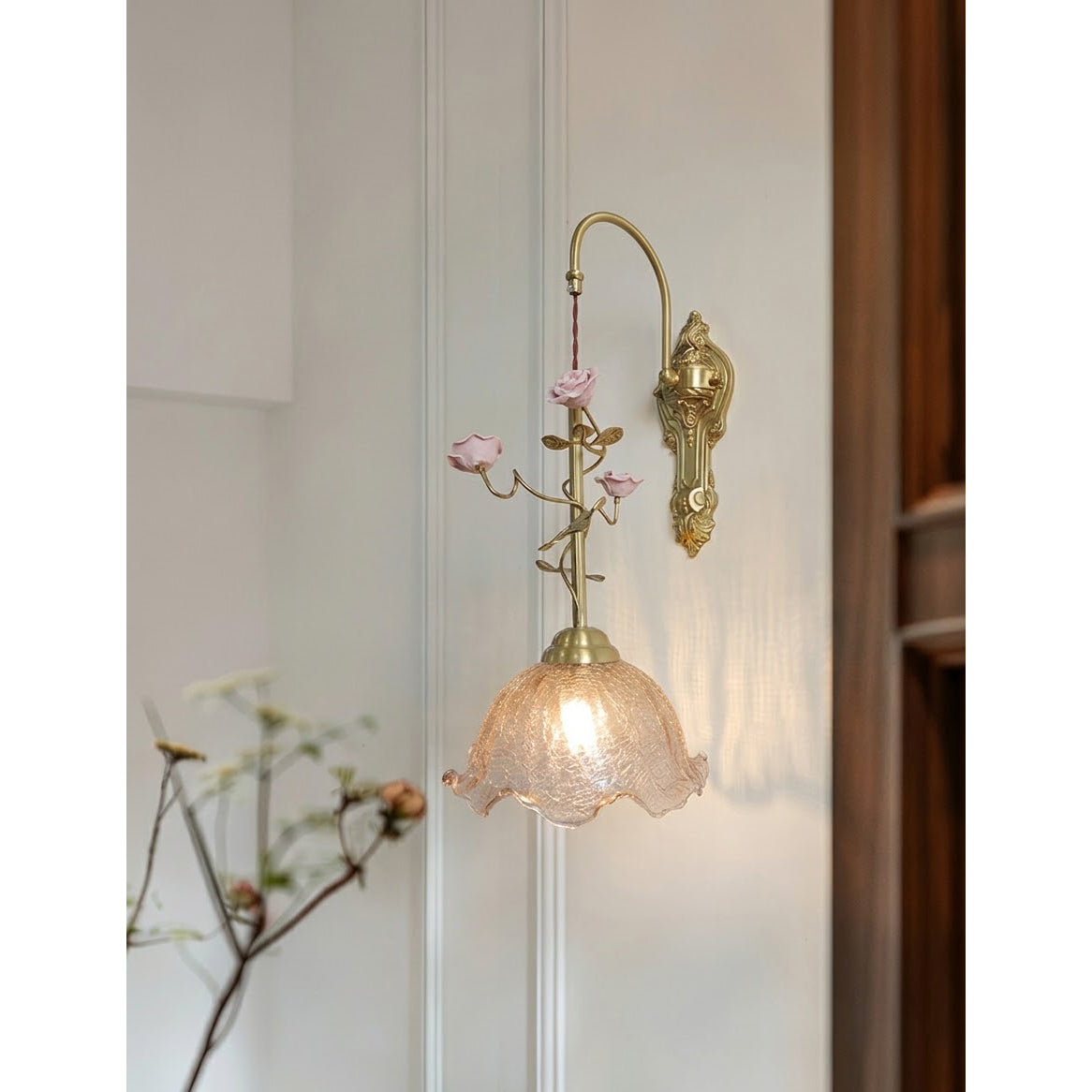 The Marilee Wall Lamp in a pink finish.