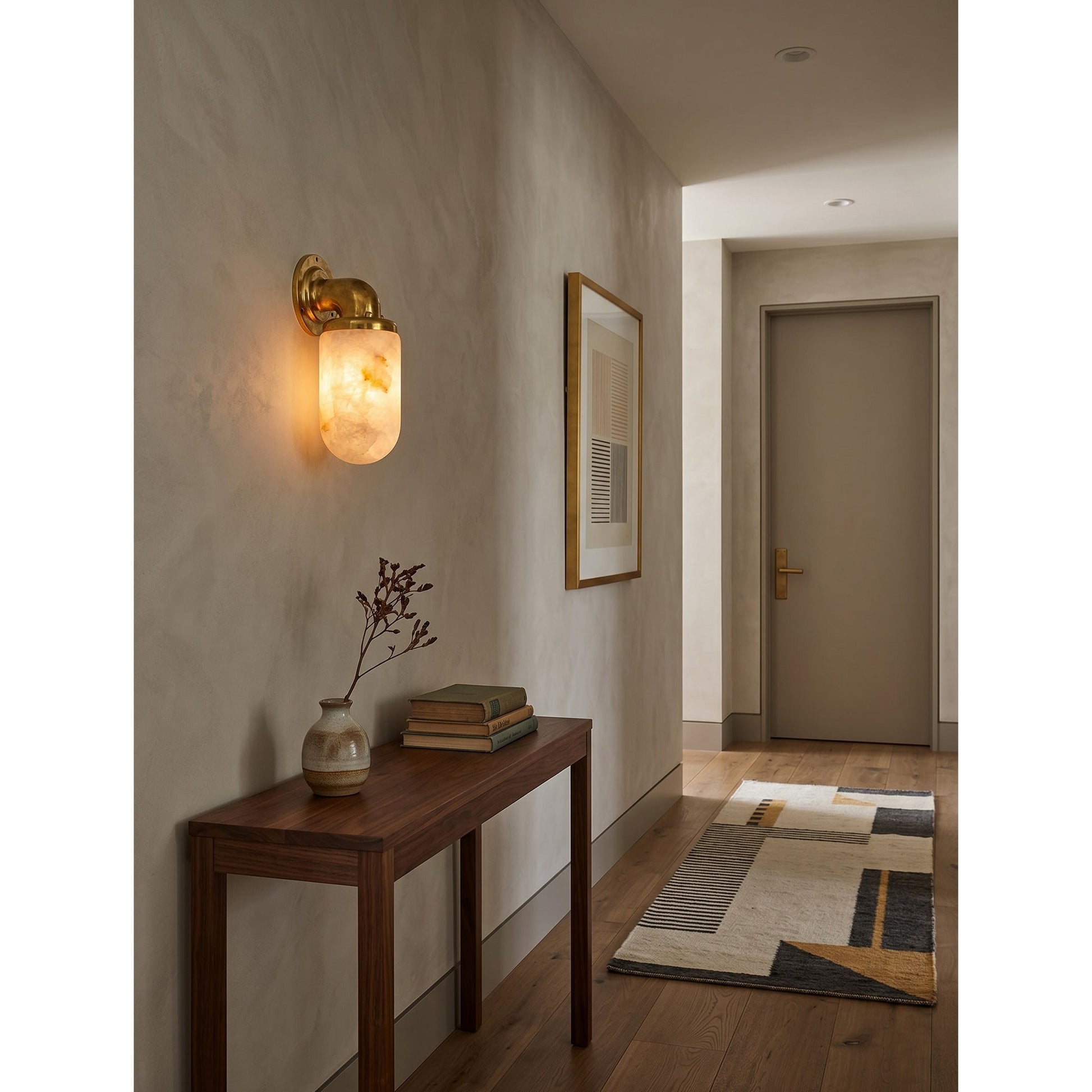 The sconce used as a bedside reading light.