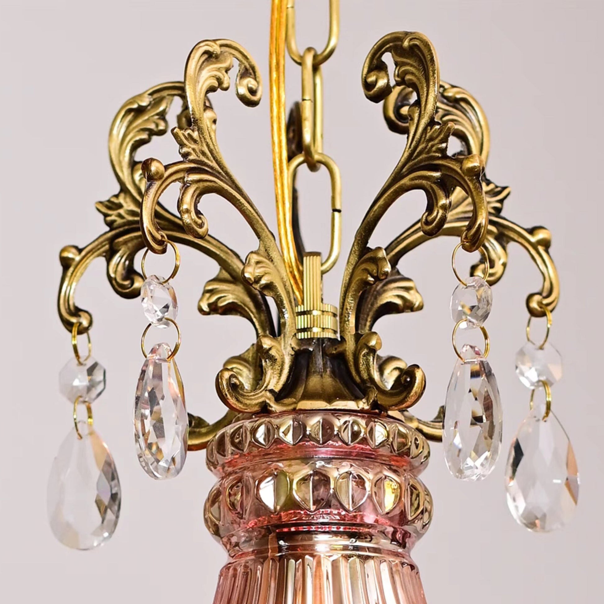 Unlit view of the purplish-red Marquise pendant lamp.