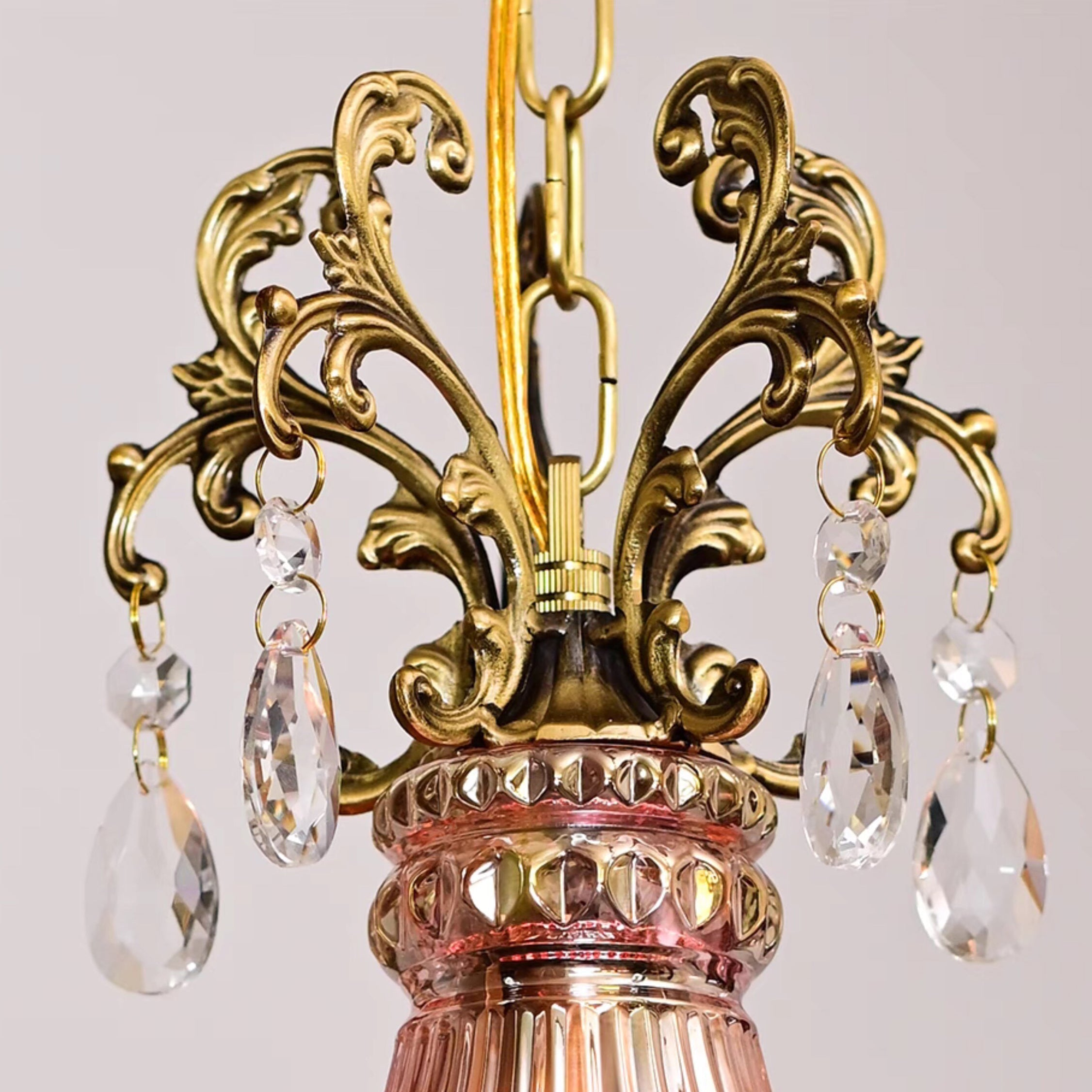 Unlit view of the purplish-red Marquise pendant lamp.
