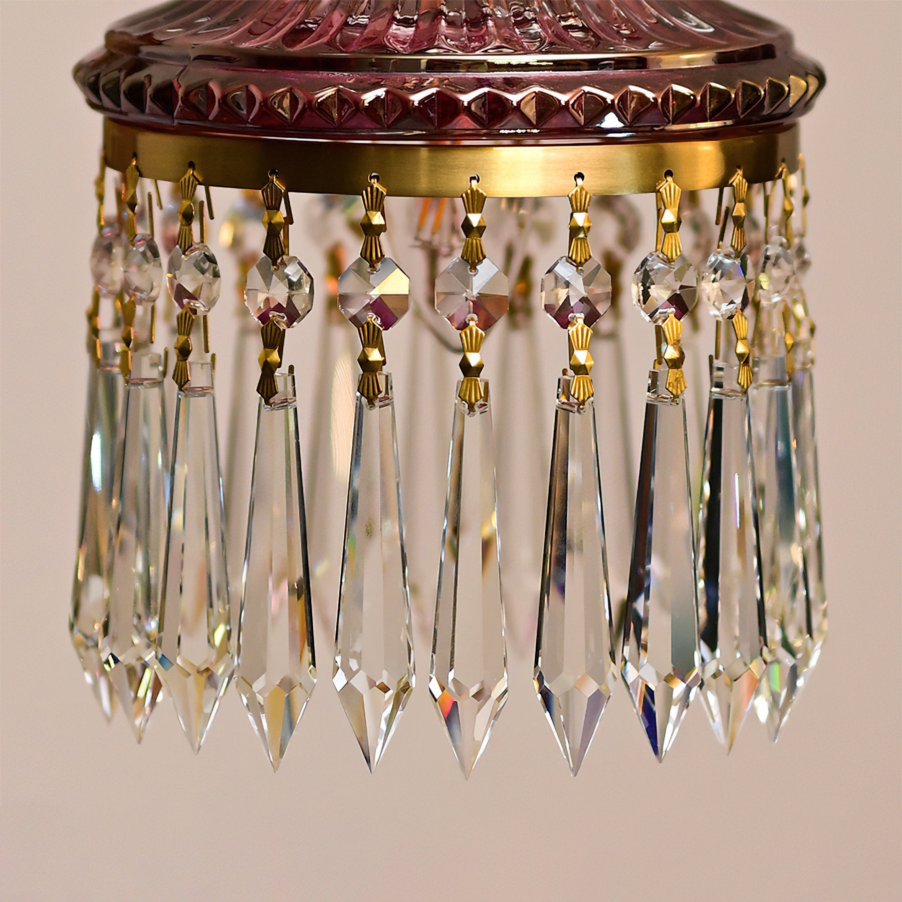 View of the lamp's ceiling canopy and hanging chain.