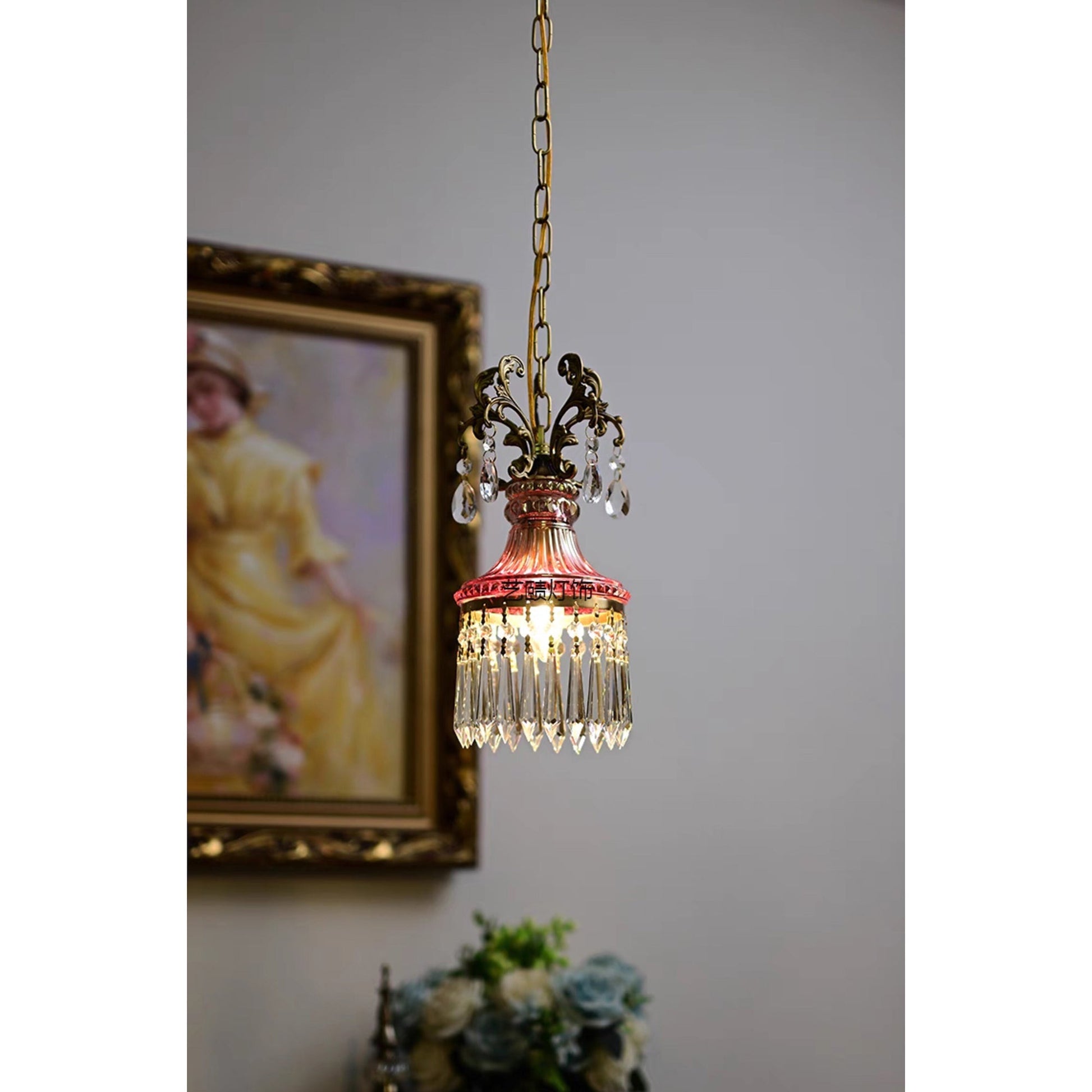 A row of Marquise Crystal Pendant Lamps styled over a kitchen island.